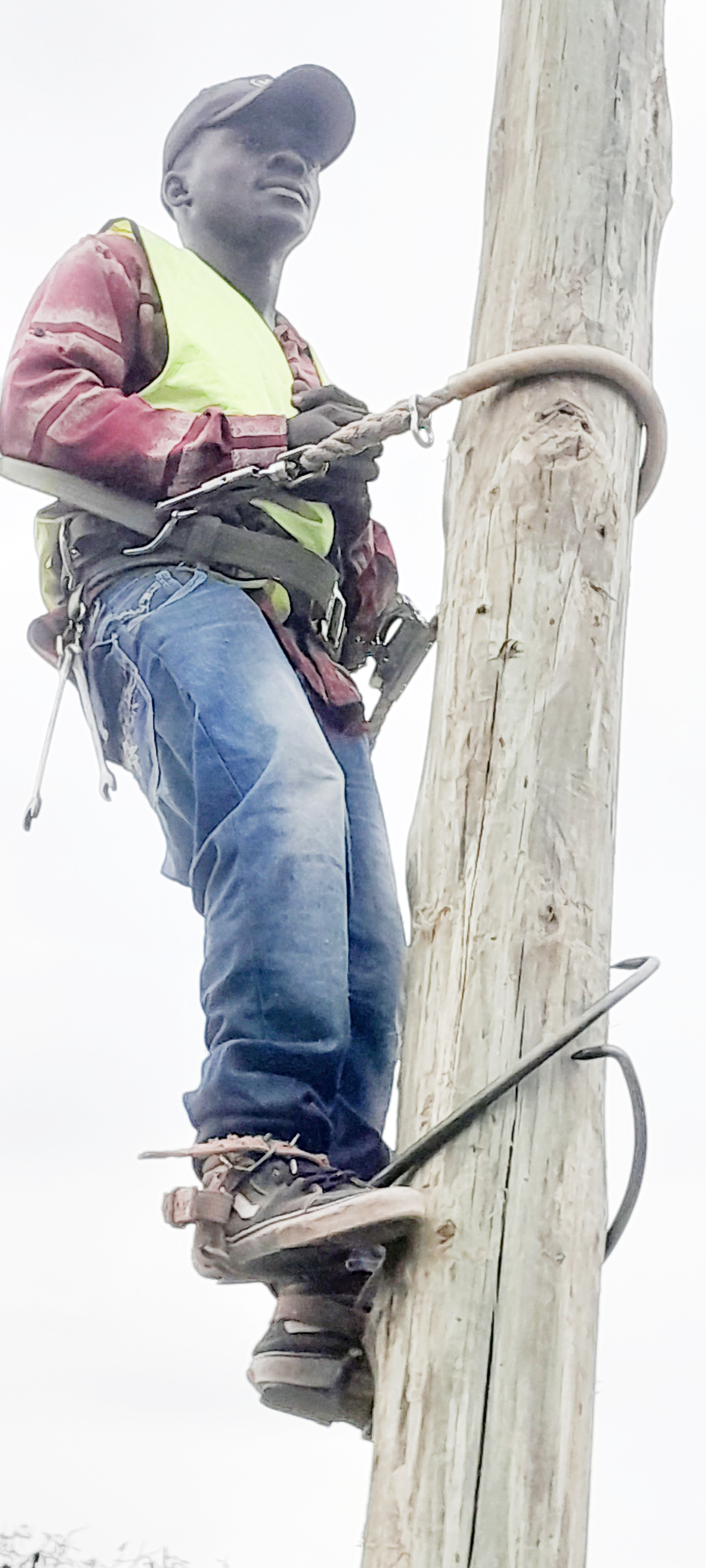 Antoni at work helping connect electricity to a remote village in Tanzania